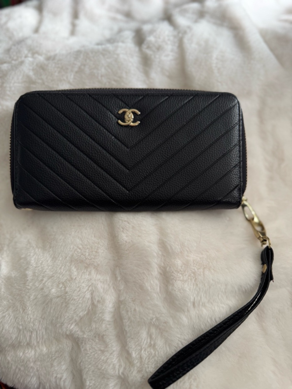 CHANEL Black Chevron Quilted Zip Wristlet with Gold CC